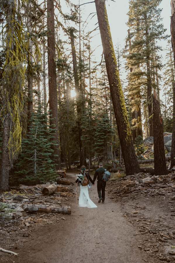 Yosemite Elopement bride and groom on Taft Point Trail