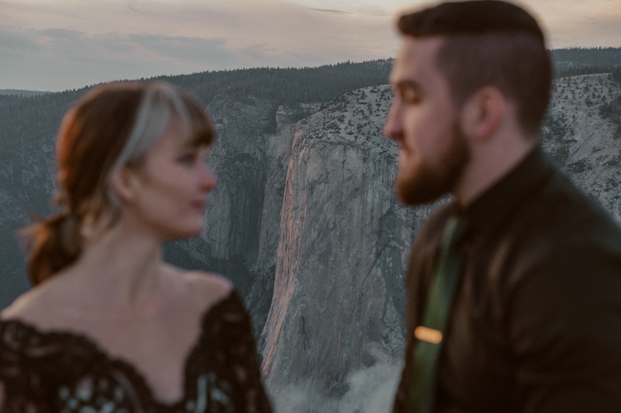 Yosemite Elopement bride and groom at Taft Point with smoke
