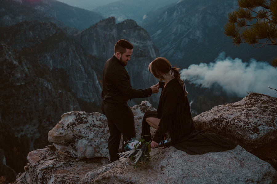 bride and groom wearing all black at Taft Point in Yosemite